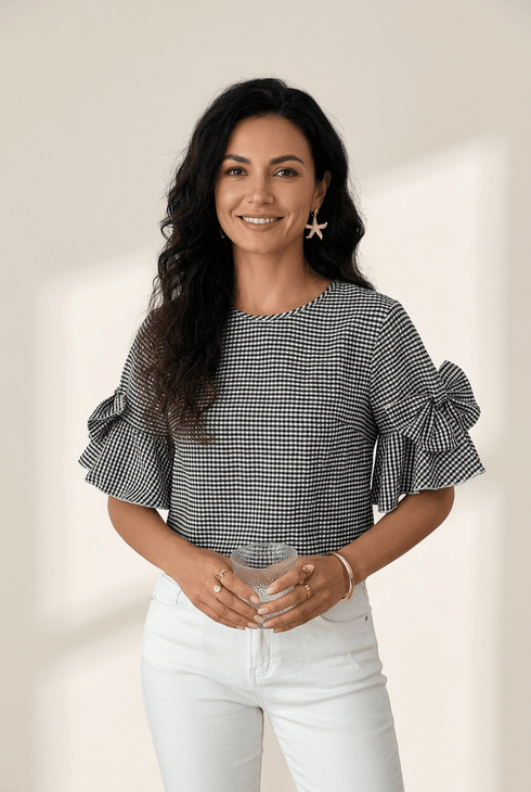 women's black gingham ruffled bow blouse with half sleeves made for easy styling and wardrobe coordination, with premium-like structure and finish.
