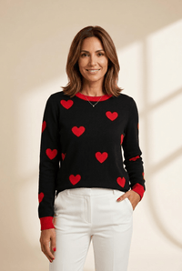 Women's Black Heart Print Crewneck Sweater with Red Ribbed Trim