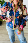 Women's Fall Fashion Floral Print Blouse in Blue with Frilly Striped Trim and Puff Sleeves for a Chic Look