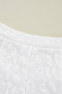 white-leopard-jacquard-quarter-zip-tee-and-shorts-set