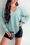 Effortless Women's Mist Blue V-Neck Pullover Top with Exposed Seams & Button Detail for Chic Casual Style