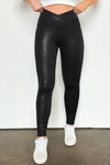 Chic Women's Black Leather Leggings with Crossed Dip Waist for a Stylish and Comfortable Fit