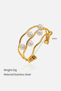 Gold Pearl Embellished Hollowed Waves Plated Bracelet