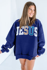 $10.38 Navy Blue WWJD Mixed Pattern Embroidered Patch Graphic Mock Neck Sweatshirt Wholesale