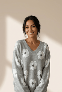 
Cozy Women's Oversized Gray Floral Print Sweater with V-Neck and Drop Shoulders for Effortless Casual Style made for easy styling and wardrobe