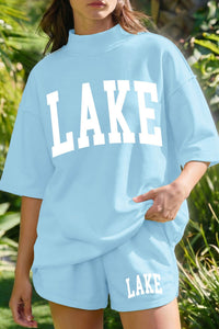 Effortless Summer Style: Mist Blue Lake Print High Neck Short Sleeve Women’s Top & Shorts Set for Casual Comfort