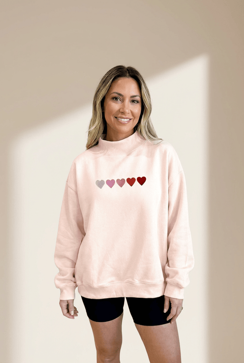 Women's Embroidered Heart Mock Neck Sweatshirt in Apricot Pink