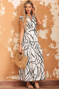 chic-print-halter-tie-waist-wide-leg-jumpsuit1703576687876
