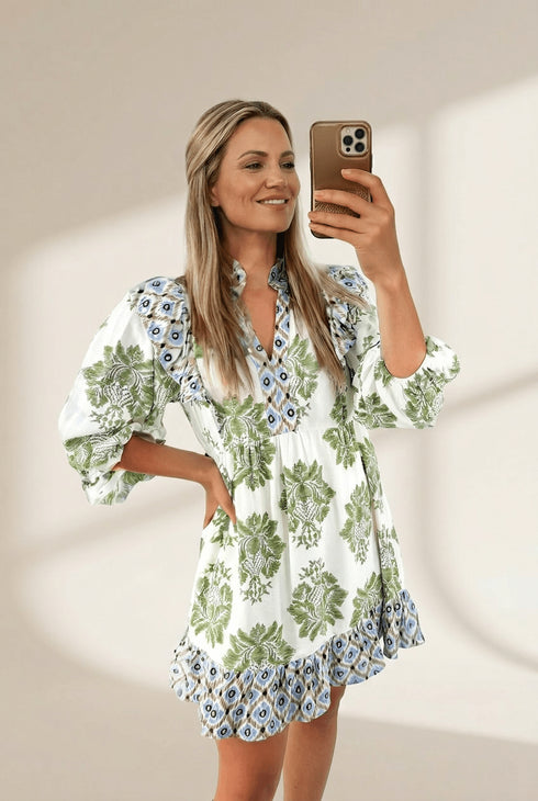 Women's Floral Viscose Mini Dress with Ruffle Hem and Patchwork with practical styling and dependable silhouette control.