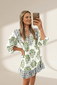 Women's Floral Viscose Mini Dress with Ruffle Hem and Patchwork with practical styling and dependable silhouette control.