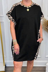 Women's Plus Size Black and Leopard Colorblock T-Shirt Dress with practical styling and dependable silhouette control.