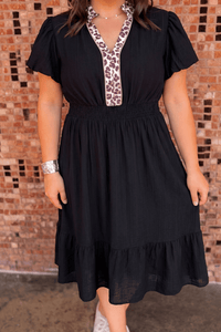 Women's Black V-Neck Midi Dress with Leopard Patchwork and Smocked Waist with practical styling and dependable silhouette control.