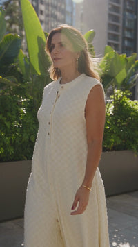 Chic Women's White Sleeveless Wide Leg Jumpsuit with Half Buttons & Textured Fabric – Perfect Summer Fashion Staple