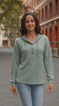 women's sage textured cable-knit henley hoodie made for easy styling and wardrobe coordination, with premium-like structure and finish. with practical