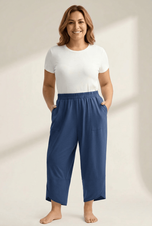 stylish-plus-size-sail-blue-loose-capris-for-women-comfortable-elastic-waist-with-trendy-asymmetrical-hem-design