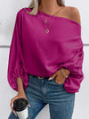 Shimmering Pink Satin Blouse with Unique Neckline and Balloon Sleeves