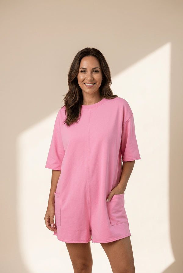 women's stylish pink loose-fit half sleeve romper for women with pockets and raw edge - ideal for summer outings with practical styling and dependable