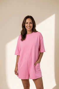 women's stylish pink loose-fit half sleeve romper for women with pockets and raw edge - ideal for summer outings with practical styling and dependable