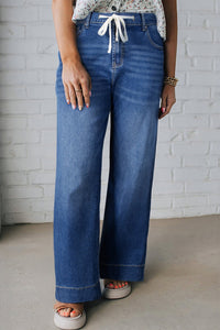 women's trendy plus size dark blue acid wash jeans for women with lace-up detail – easy and wearable fit with practical styling and dependable