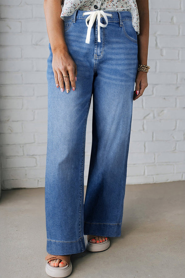 Women's Trendy Women's Plus Size Light Blue Acid Wash Jeans with Lace-Up Detail for Stylish Casual Outfits