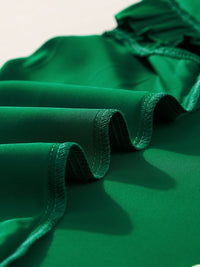 Vibrant Green Pleated Sleeveless Blouse with Frilled Mock Neck