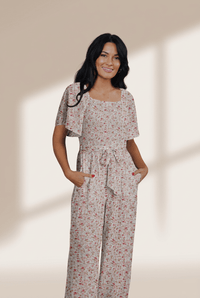 Women's White Floral Smocked Jumpsuit with Flutter Sleeves