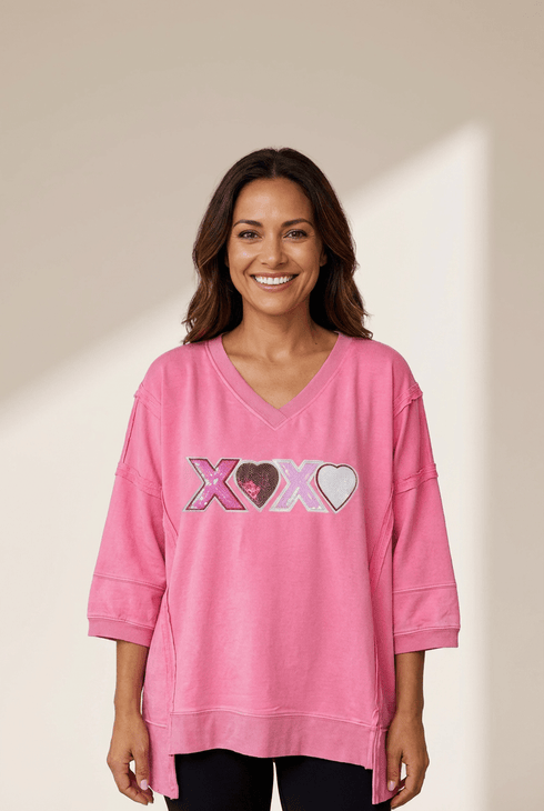 Women's Bonbon Pink Sequin XOXO V-Neck Top with Raw Seams