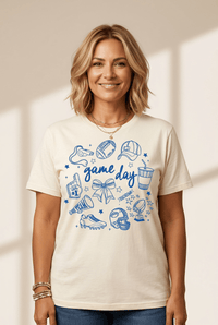
Women's Game Day Football Doodle Graphic Tee in Cream made for easy styling and wardrobe coordination, with premium-like structure and finish.