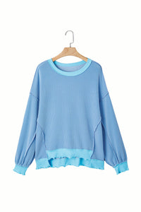 Myosotis Twisted Rib Uneven Hem Drop Shoulder Loose Knit Top