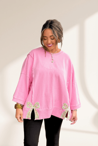 Women's Pink Floral Bow Sweatshirt with Exposed Seams and Slits with practical styling and dependable silhouette control.