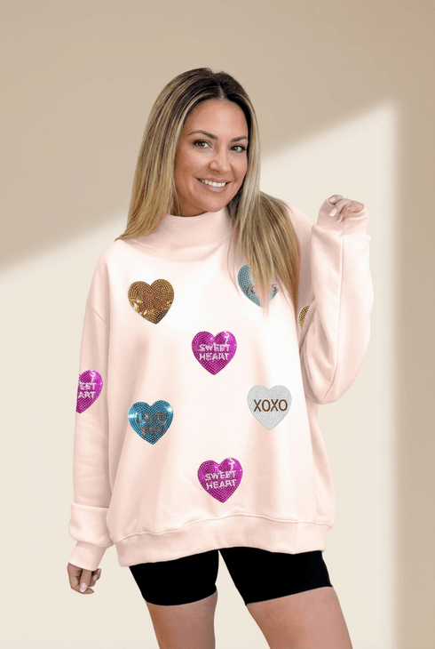 Women's Sequin Heart Mock Neck Sweatshirt in Apricot Pink