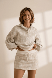 
Women's Woodland Abstract Print Pullover and Mini Skort Two-Piece Set with practical styling and dependable silhouette control.