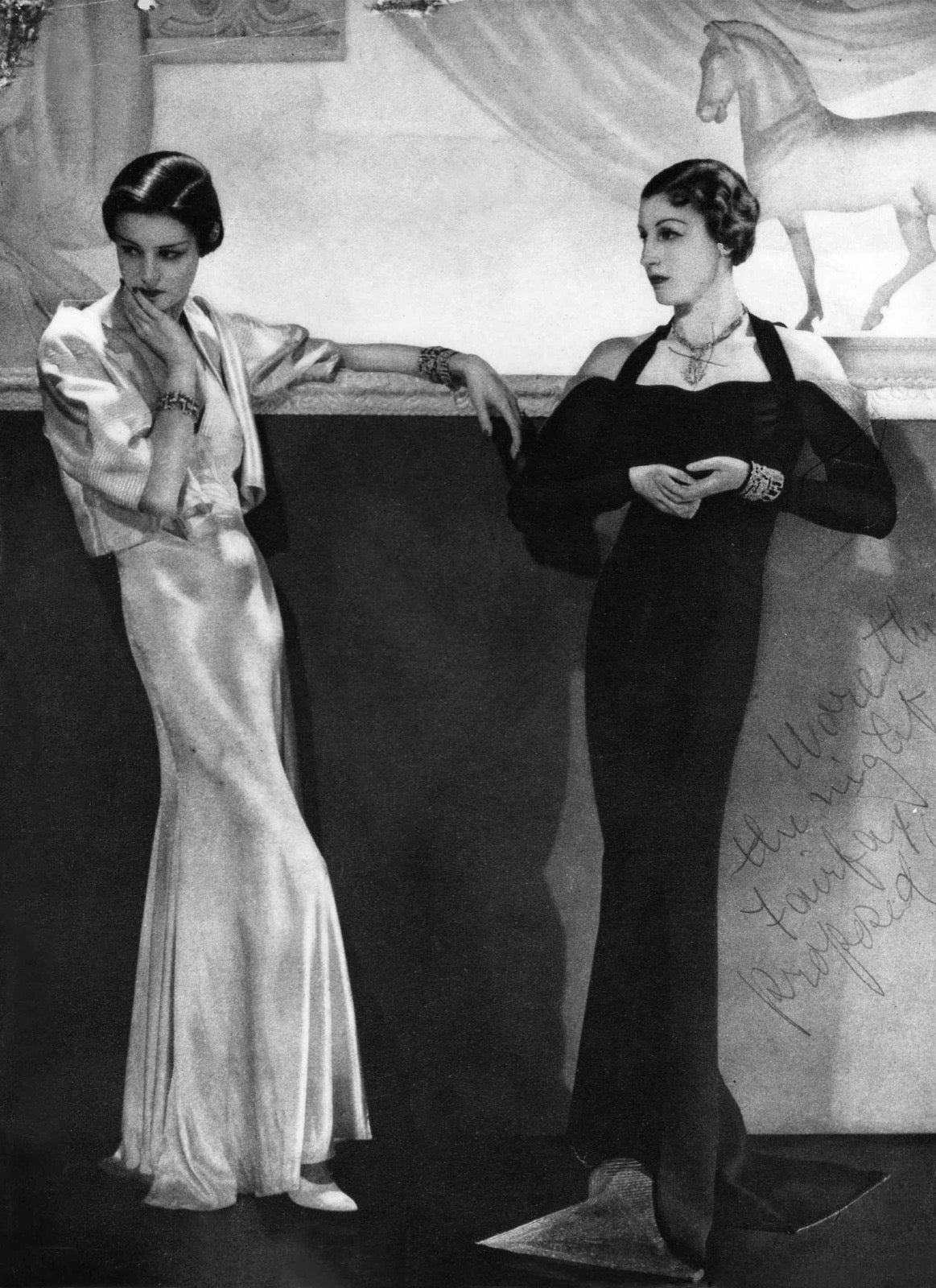 Evening gown with asymmetric neckline baring one shoulder.