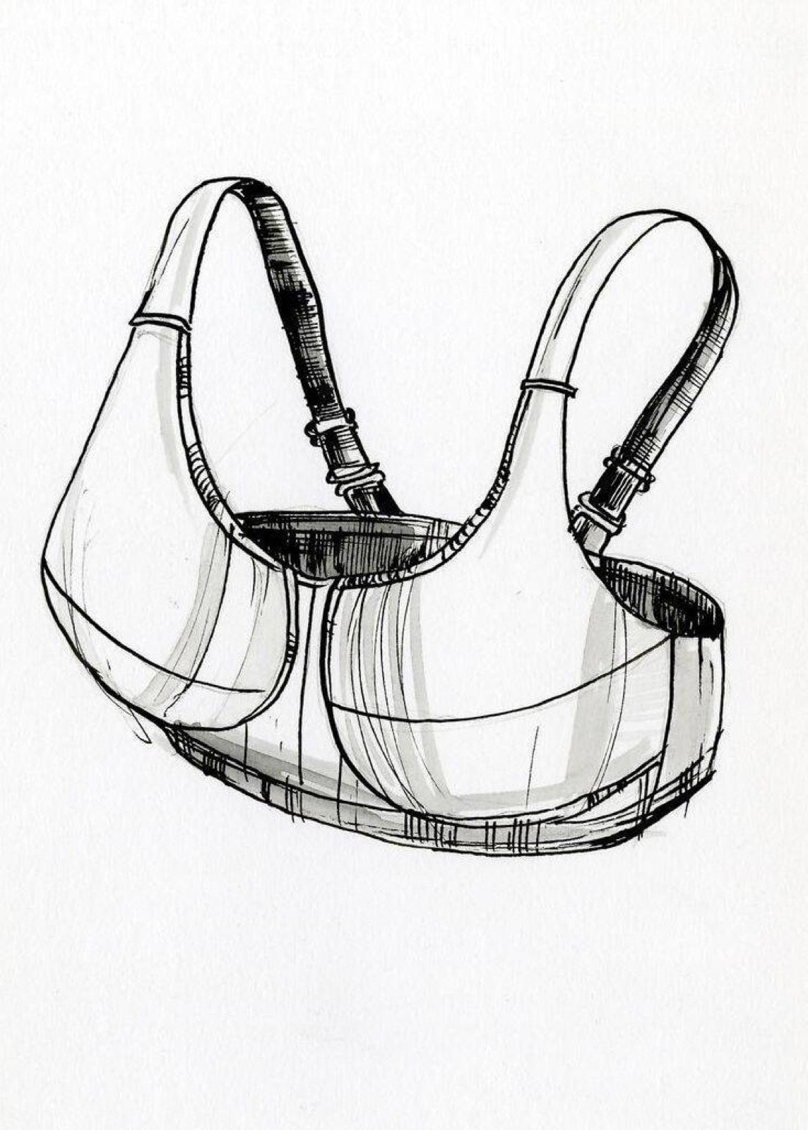 Bra undergarment layer providing bust support beneath dress.