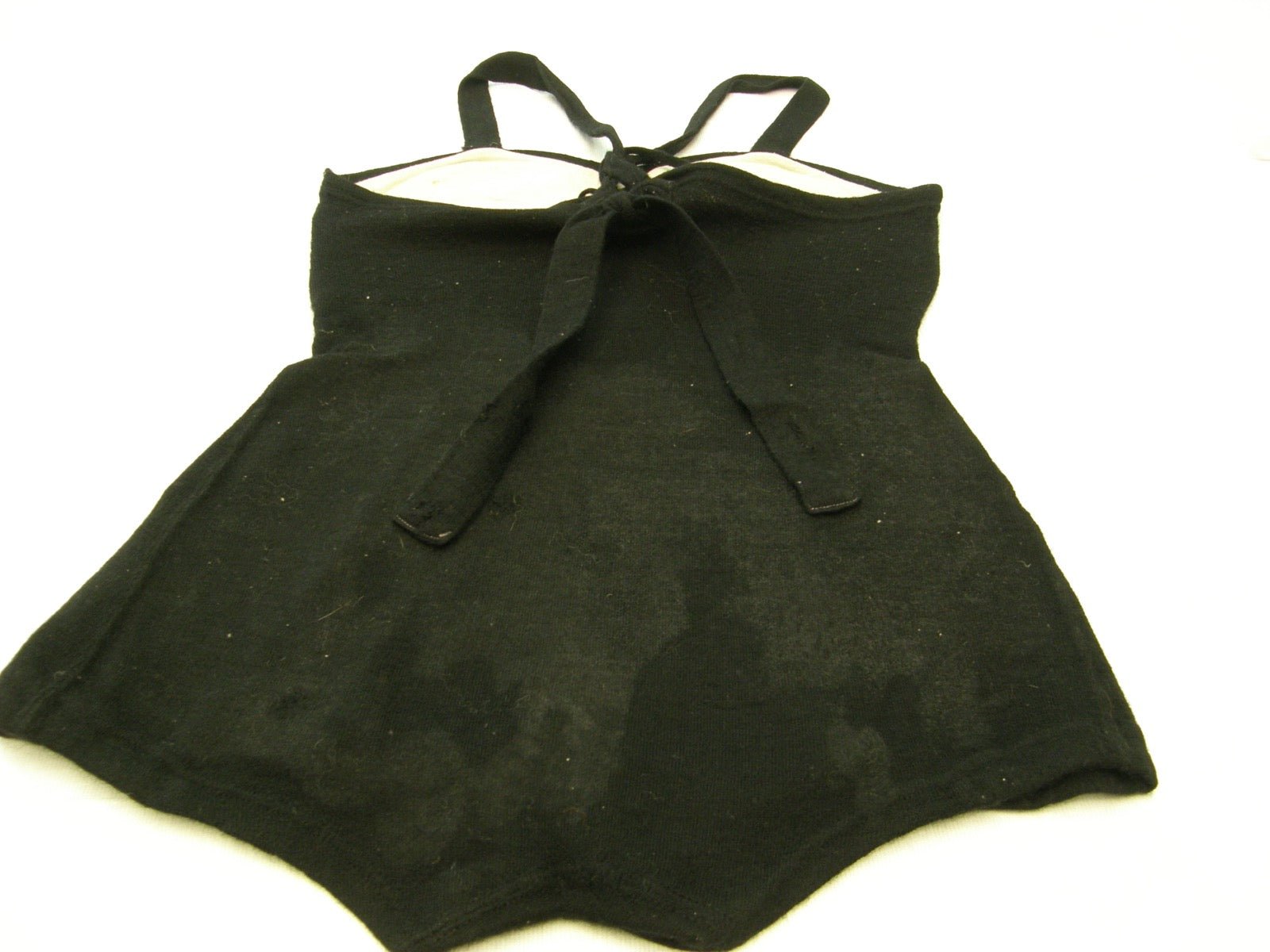 One-piece swimsuit with integrated bust support panel at bodice.