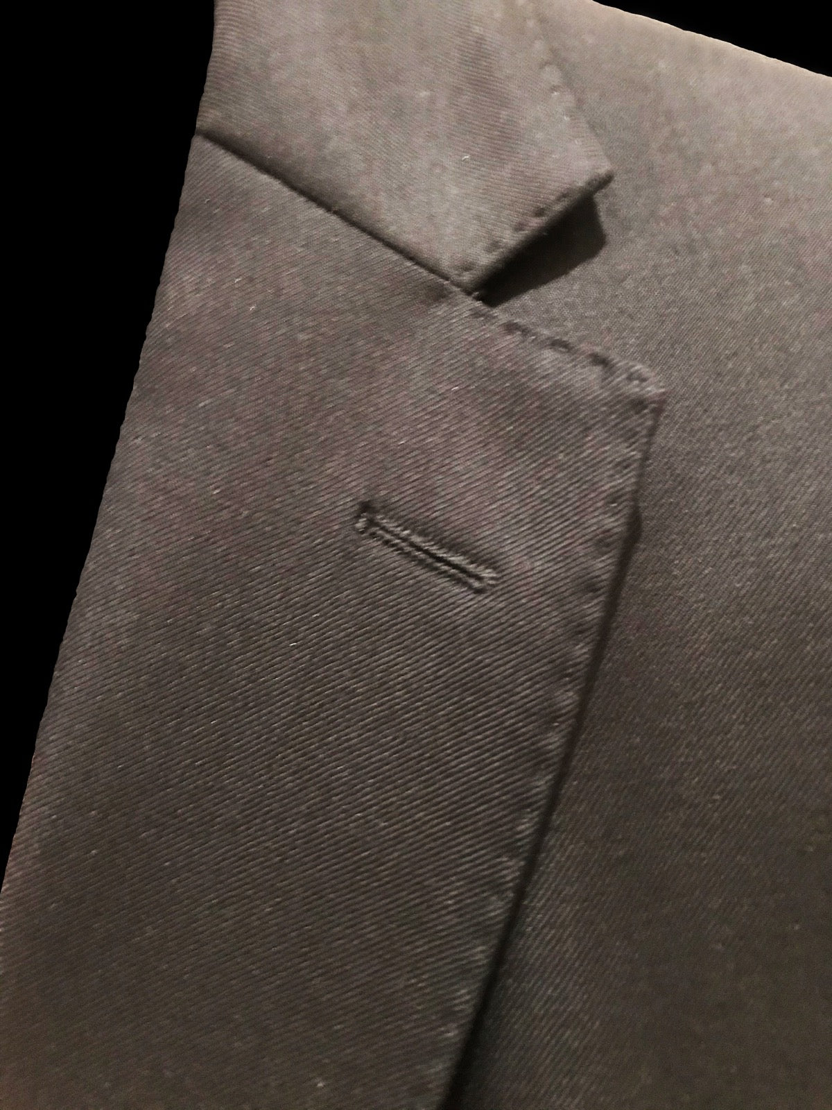 Collar roll line on English tailored jacket lapel construction.