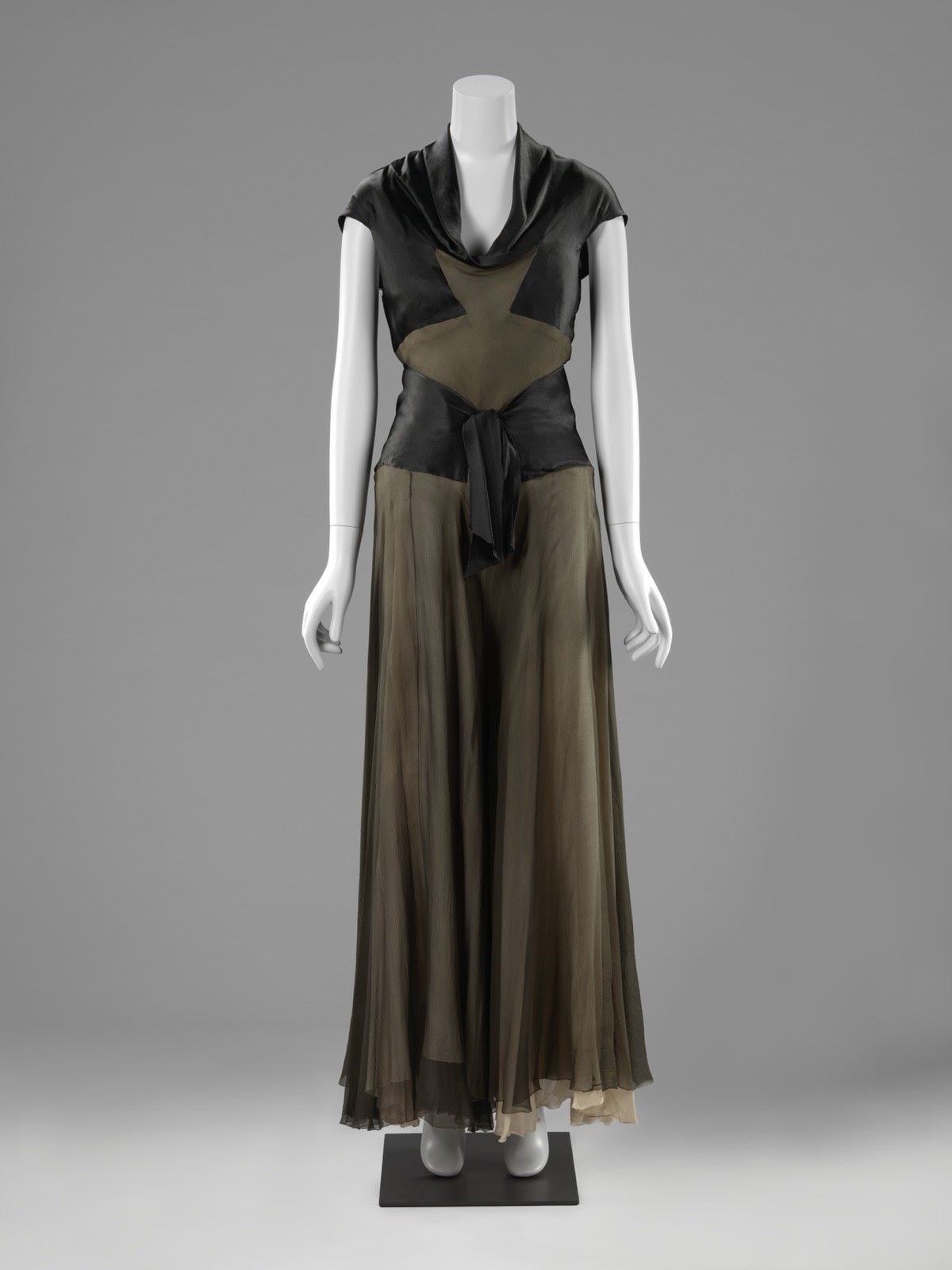 Loungewear with draped cowl folds at the neckline.