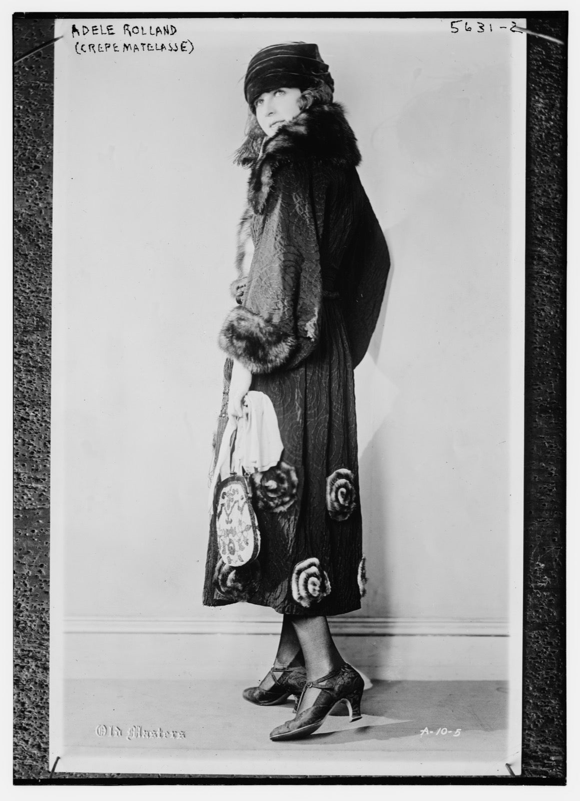 Historic textile sample of crepe matelasse with blistered surface texture.