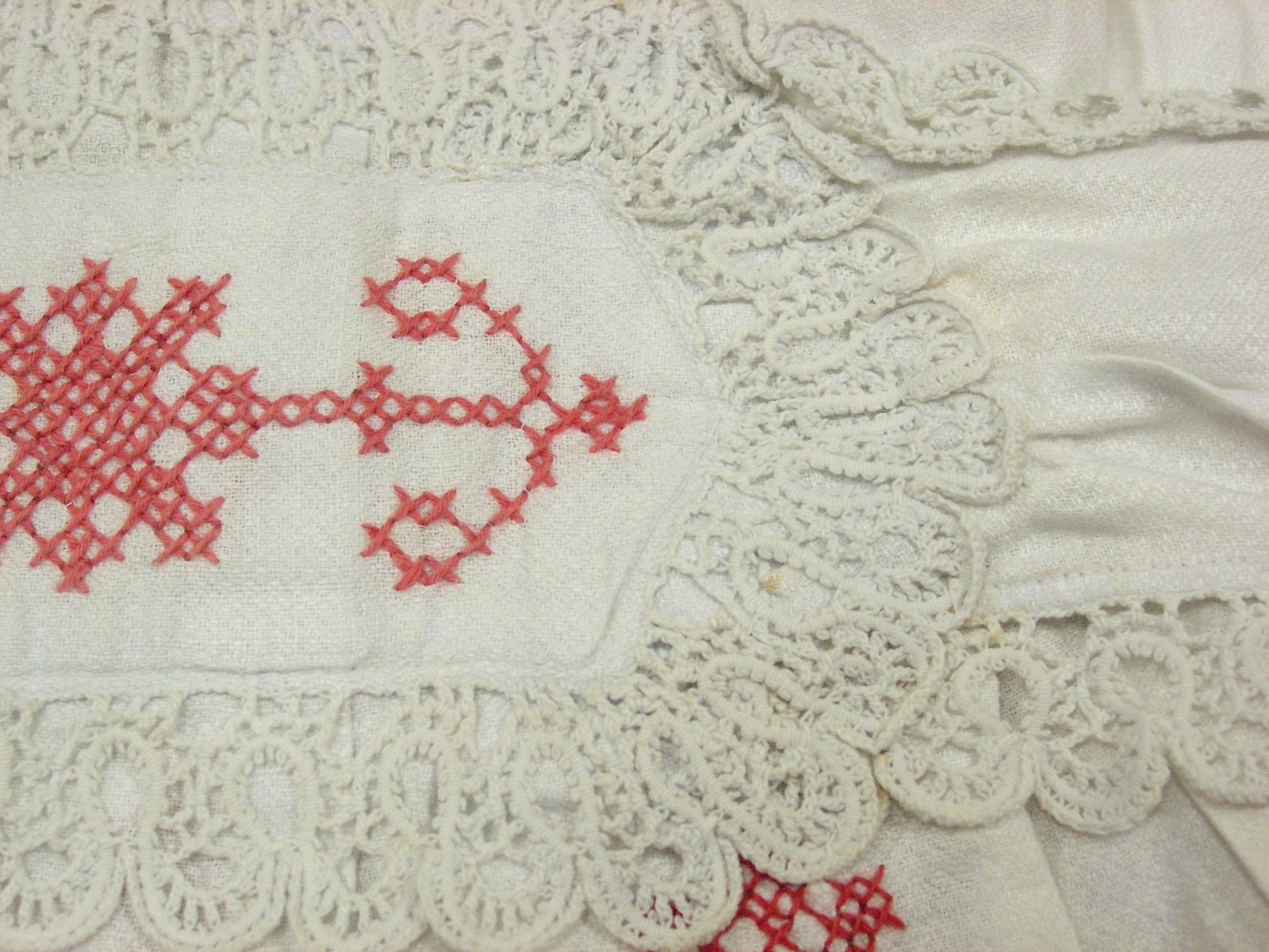 Dress with cross straps at back bodice panel intersection.