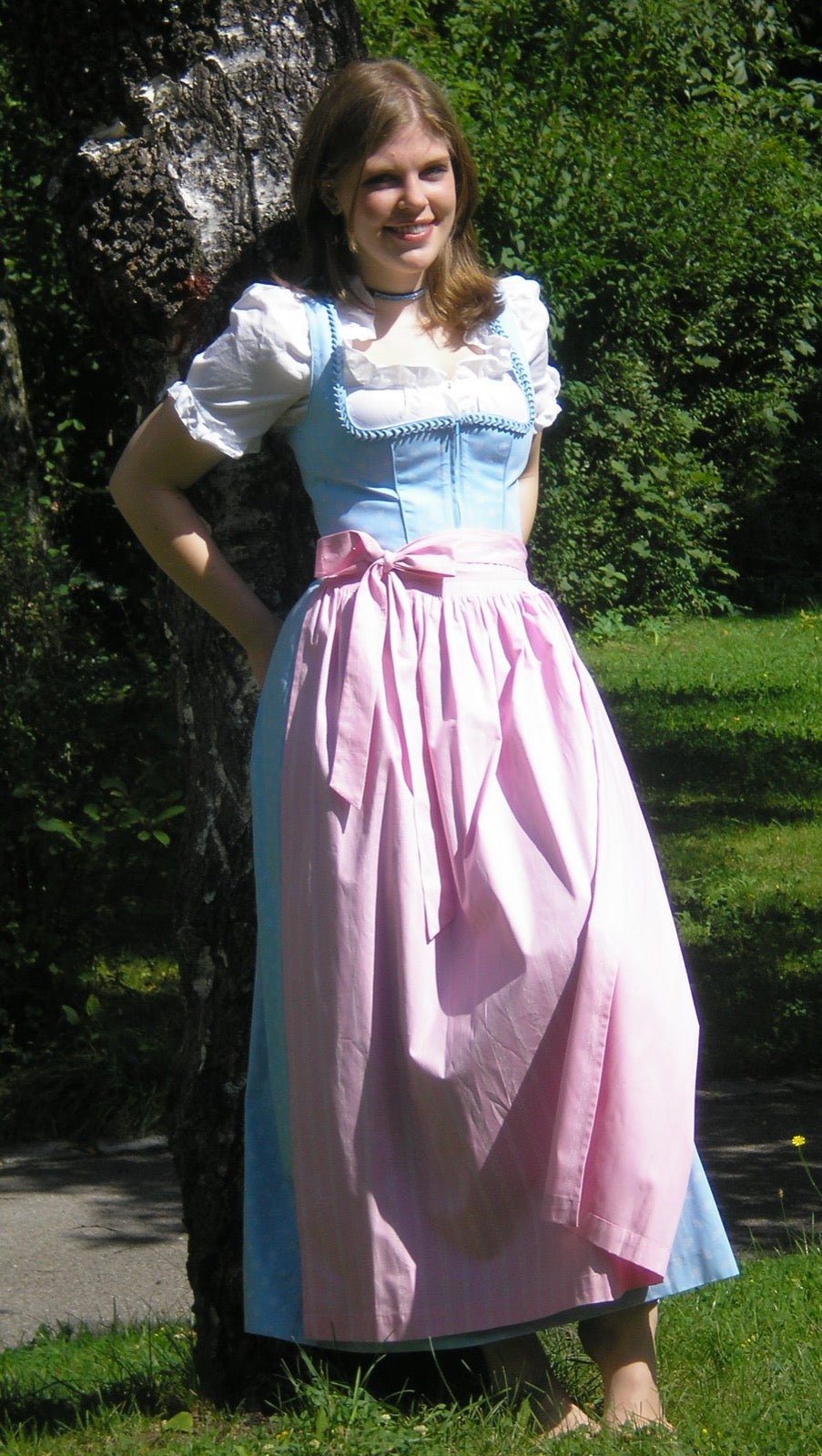 Dirndl folk silhouette fitted bodice full skirt dress.