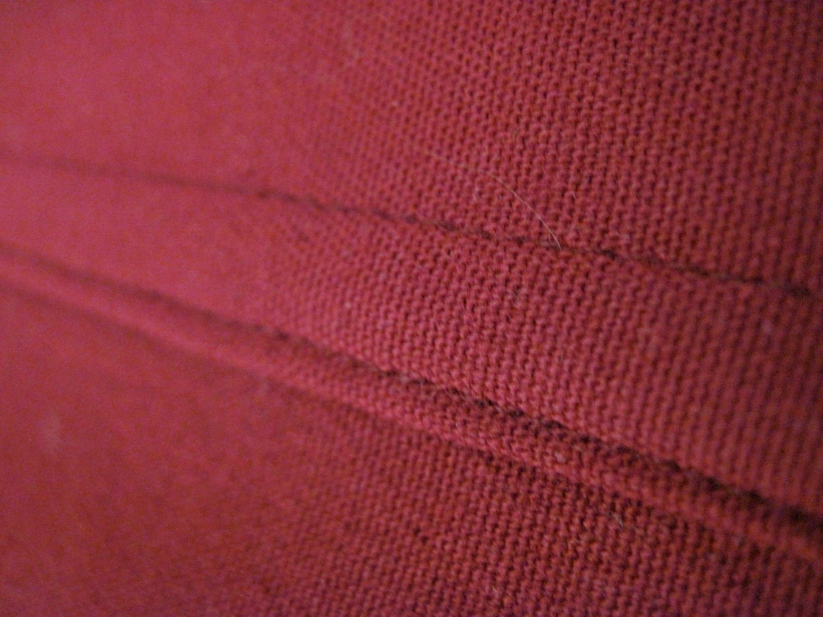 Flat-felled seam enclosed folded edge joinery.