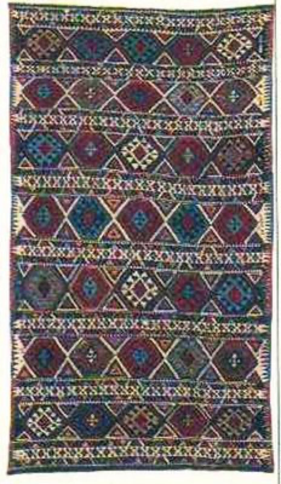 Azerbaijani kilim flatweave rug with geometric slit-tapestry pattern.