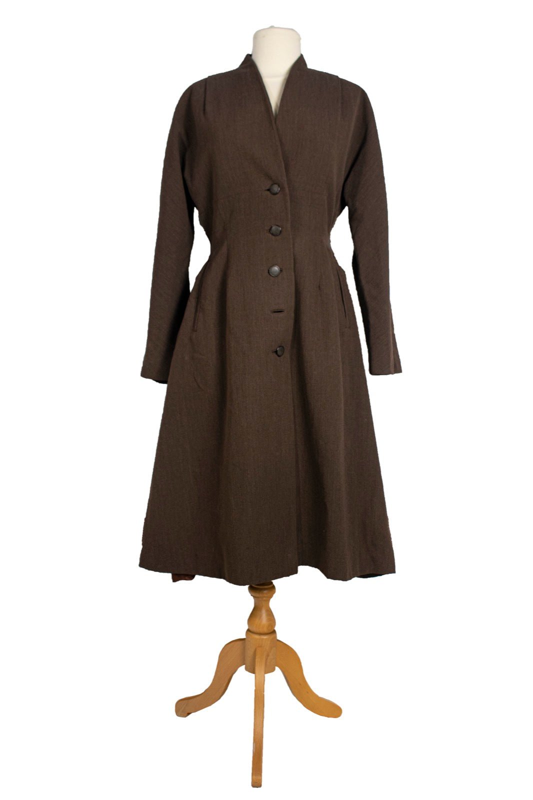 Fully lined coat with interior lining layer visible at opening.
