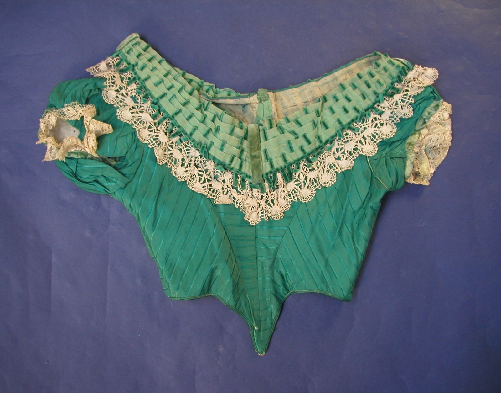 Dress with mesh insert panel set into bodice opening.