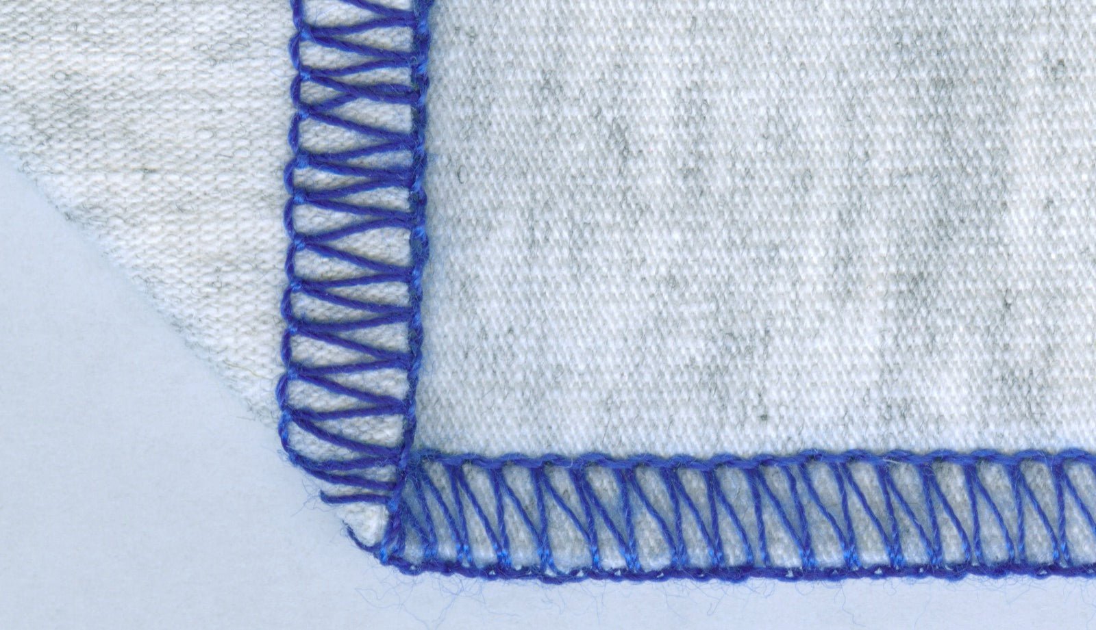 Overlock seam multi-thread edge finish joinery.