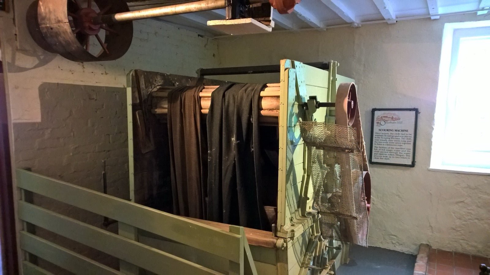Otterburn Mill scouring machine washing wool and textile fiber in mill trough.