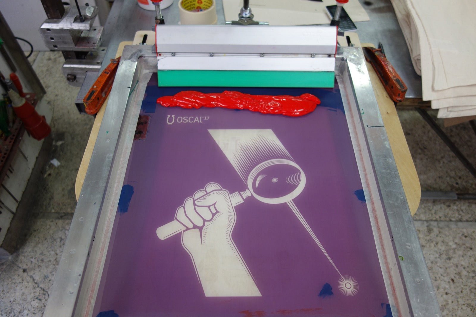 Silkscreen printed materials laid out at OSCAL 2017 maker workshop.