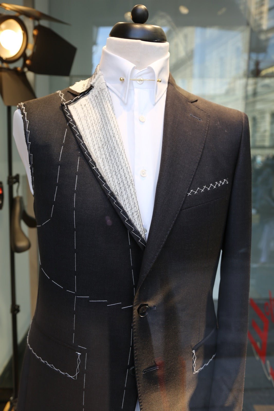 Sew-in canvas interfacing hand stitched inside tailored jacket.