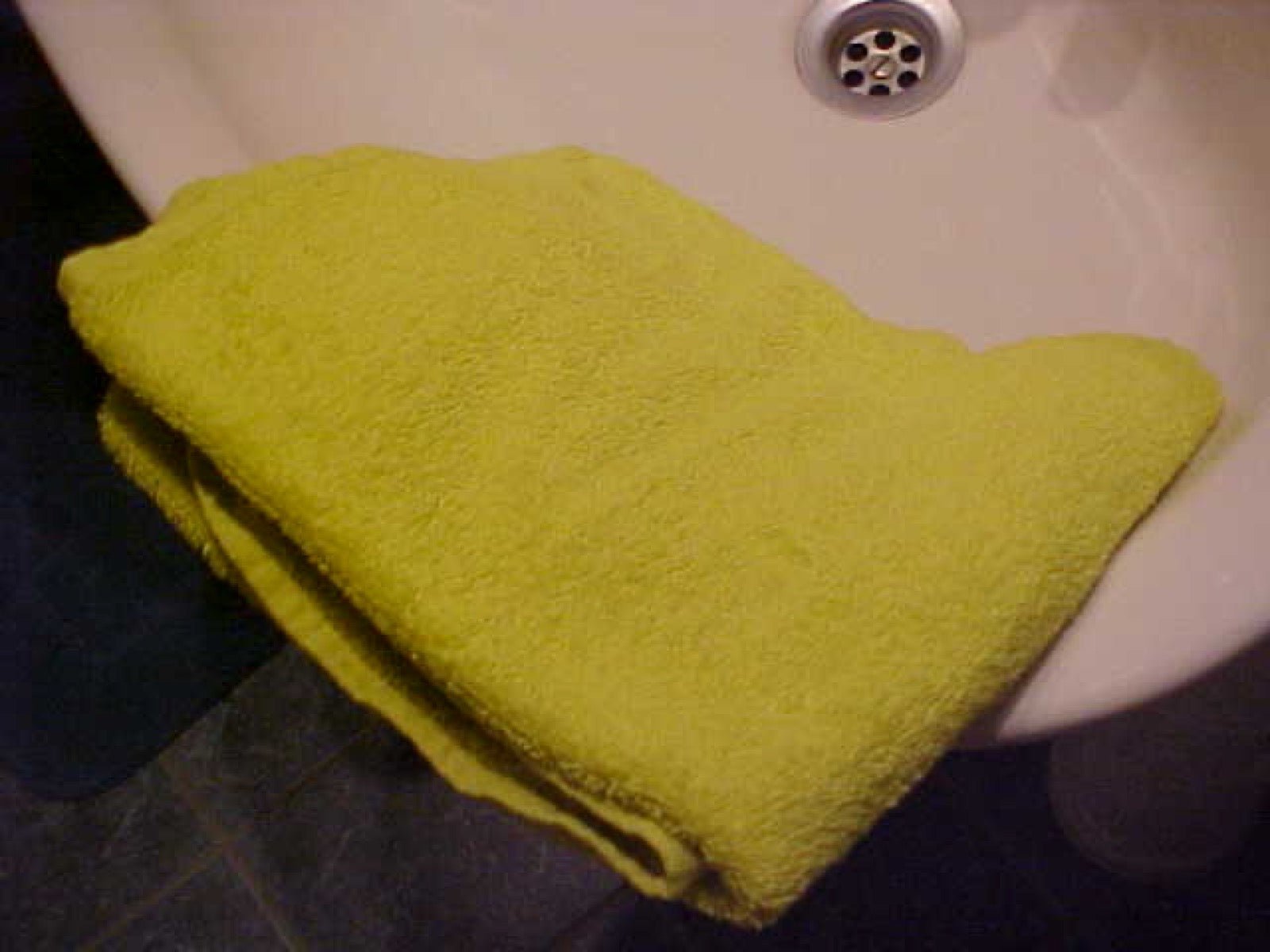 White terrycloth towel showing uncut loop pile on the surface.
