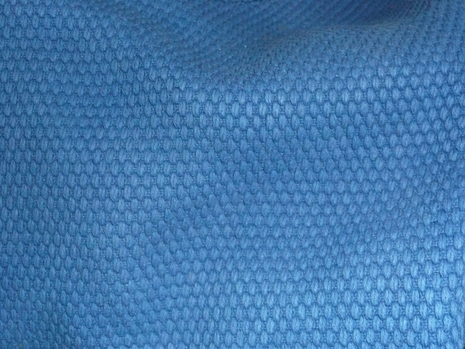 Compound weave kimono showing multiple interlocking yarn systems.